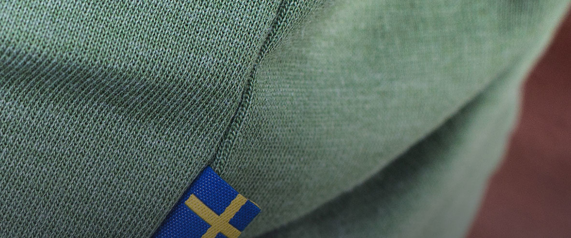 Closeup of swedish flag stitched on fabric